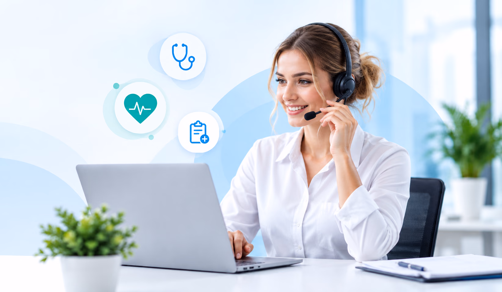 A billing support specialist wearing a headset, working at a laptop